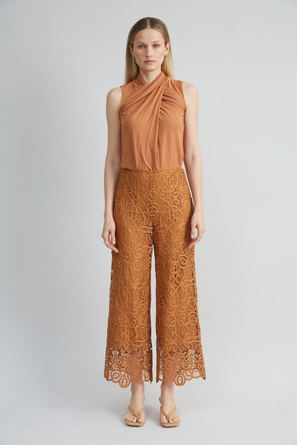 Sleeveless Twist Neck Knit